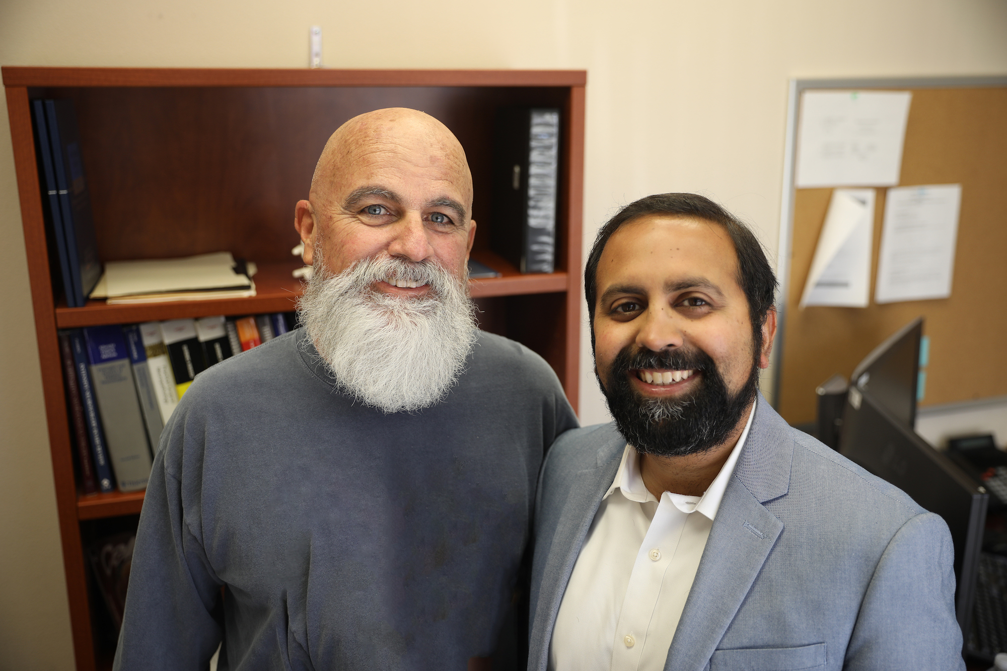 Spinal tumor ablation surgeon Dr. Hussain and patient Dave Romero 