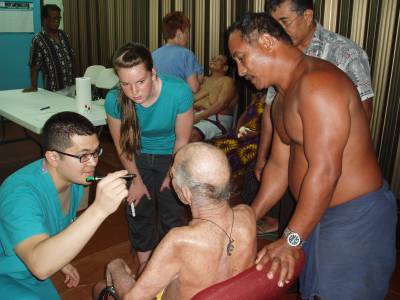 Student providers examining patients