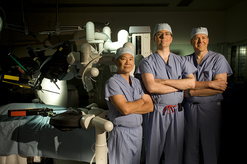 3 doctors in front of equipment