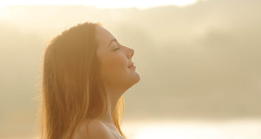 Woman breathing deeply