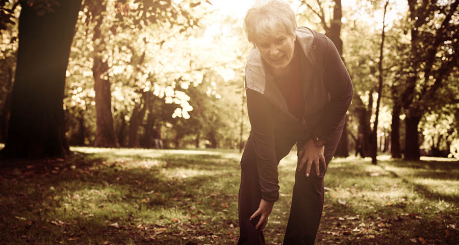 Elderly woman suffering with diabetic nerve pain