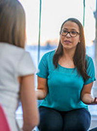 Woman talking in a group