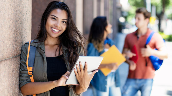 happy student intern outside