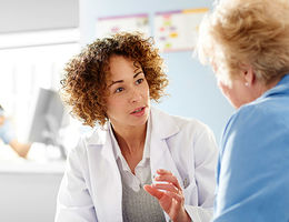 A physician seeing a patient 