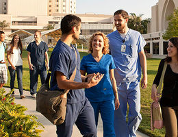Students walking together outdoors at Loma Linda University Health