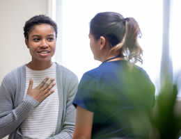 doctor talking to patient