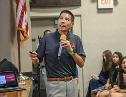 Dr. Tan presenting to a junior high about the dangers of vaping