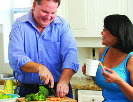 Couple preparing a meal at home