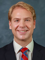 Travis Junge, MD