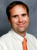 Travis Losey, MD