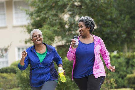  Two senior black women exercising together stock photo