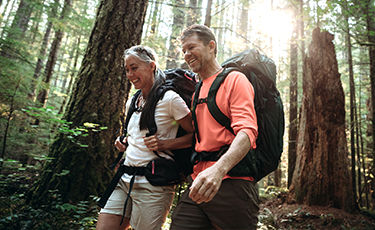 men hiking in the woods