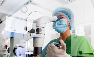 Scientist in lab performing research