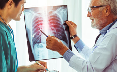 Doctor reviewing patient's Xrays