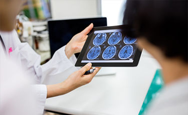 Doctor looking at patient scan