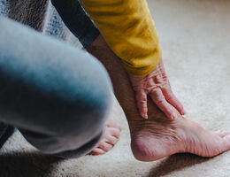 woman grabbing at your ankle 