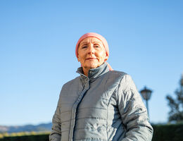 Senior Caucasian Woman With Jacket And Pink Headscarf Cancer And Optimism 